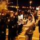 Protesters confront Baltimore police officers as they march through the streets after a mistrial was declared in the trial of Baltimore Police Officer William G. Porter, for the death of Freddie Gray, on Dec. 16, 2015, in Baltimore. (Rob Carr/Getty Images)
